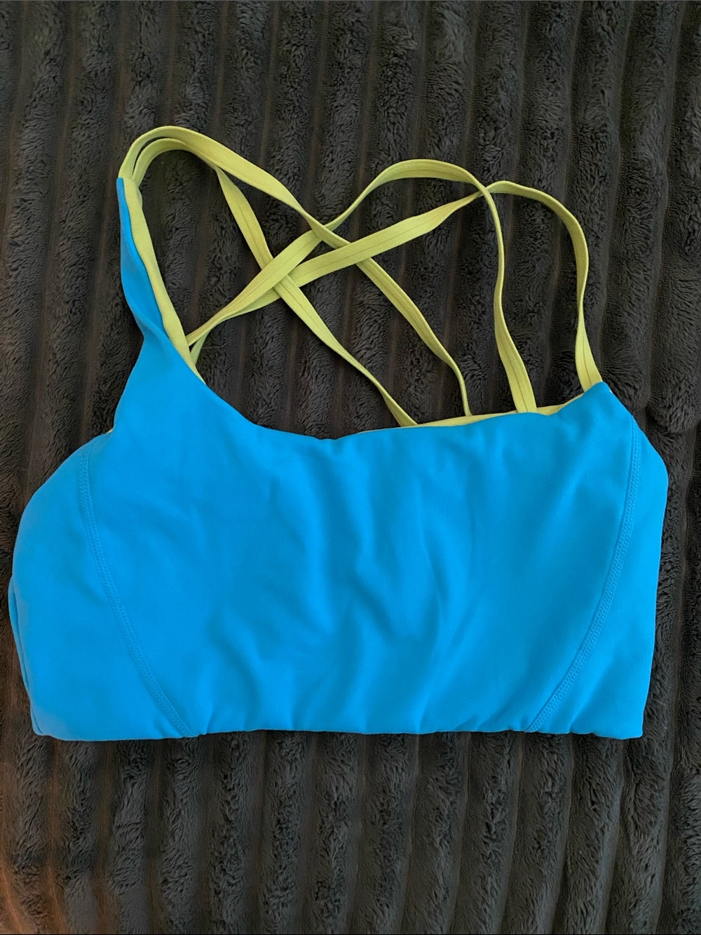 Crisscross Strap Blue Sports Bra with Yellow Accents